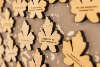 Wooden maple leaves engraved with donors names