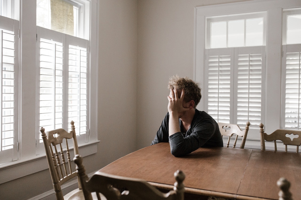 Man Depressed at the Table