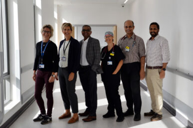 A photo of six doctors in a corridor at Musgrove Park Hospital.