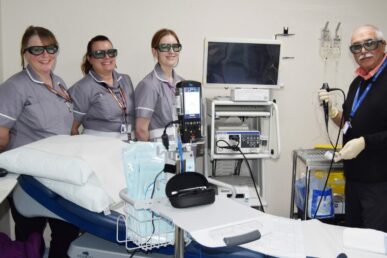 A photo of healthcare colleagues wearing protective glasses in a treatment room at Yeovil Hospital.