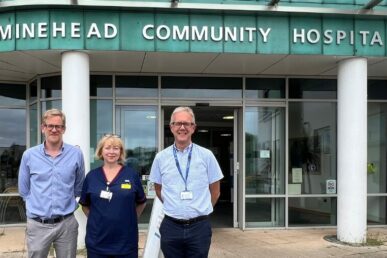 A photo of Somerset's rheumatology team stood outside Minehead Community Hospital.
