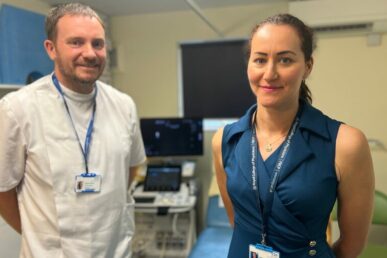 A photo of a sonographer and rheumatology consultant stood in an ultrasound room at Wellington Hospital.