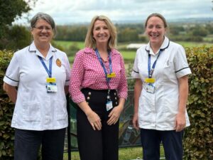 People from the South Somerset based integrated community stroke service stood next to a field.