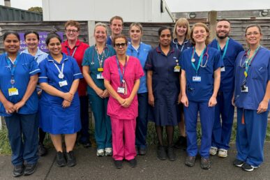 A photo of Musgrove Park Hospital's neonatal unit team in their uniform. They are stood outside the unit.