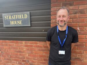 An electrical technician and supervisor stood outside one of the buildings at Wellington Hospital.