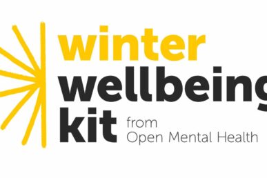 A yellow and black graphic with the words Winter Wellbeing Kit on it.
