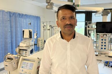 A photo of nurse Dayananda Omkarappa stood in the critical care unit at Yeovil Hospital.