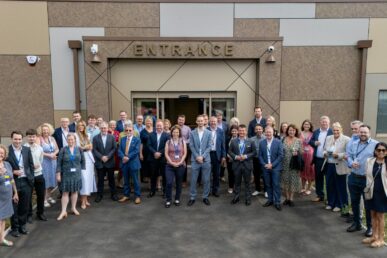 A photo of people stood outside the front of the new Bridgwater Diagnostic Centre at its official opening ceremony.