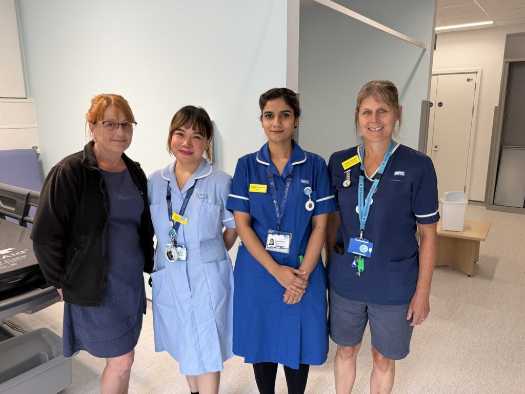 A photo of the theatre admissions lounge team in the King's Building at Musgrove Park Hospital.